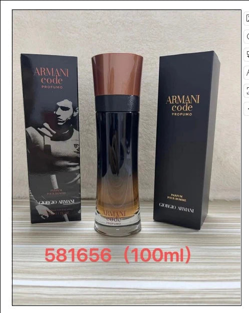 Armani Code Profumo cologne by Giorgio Armani, 100ml bottle with its black packaging boxes on a light wood surface. The bottle has a dark gradient body with a metallic copper cap, flanked by two black boxes with gold lettering.