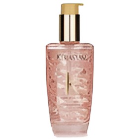 A bottle of Kiehl's Paris skin cream in a textured pink glass container with a gold pump dispenser, shown against a plain white background.