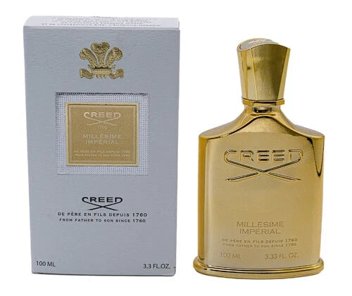 Gold Creed perfume bottle and packaging on a white background