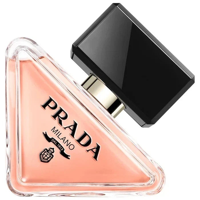 Prada Milano perfume bottle with black cap on a white background